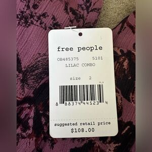 New! With tags! Free People Lilac Flower Crop Romper! Deep V and Low Back